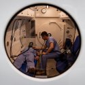 Leading Seaman medic Rhys Noblett (right) conducts medical training within the hyperbaric chamber at the Submarine and Underwater Medical Unit at HMAS Penguin.