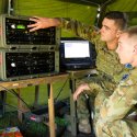 Signallers Nathan Milnes and Jordan Jessen from 7th Combat Signal Regiment work with Integrated Battlefield Telecommunications Network equipment on Exercise Carbon Diamond.