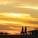 No. 1 Squadron aircrew walking out to their F/A-18F Super Hornets as the sun sets at RAAF Base Darwin, Northern Territory during Exercise Arnhem Thunder 21.