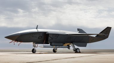 An MQ-28A Ghost Bat loaded with an AIM-120 Advanced Medium Range Air-to-Air Missile during Trial Kareela at RAAF Base Woomera, South Australia.
