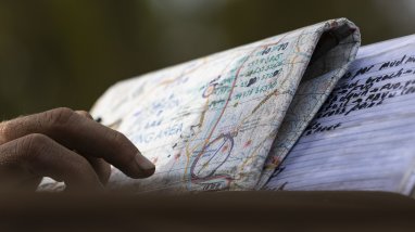 Australian Army officer Lieutenant Jackson Say from 3rd Combat Engineer Regiment, reads command notes on a map during a live fire M58 Mine Clearing Line Charge (MICLIC) Serial at Townsville Field Training Area, Queensland, on 06 September 2025.